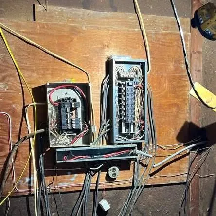 Open breaker panel with neatly dressed conductors